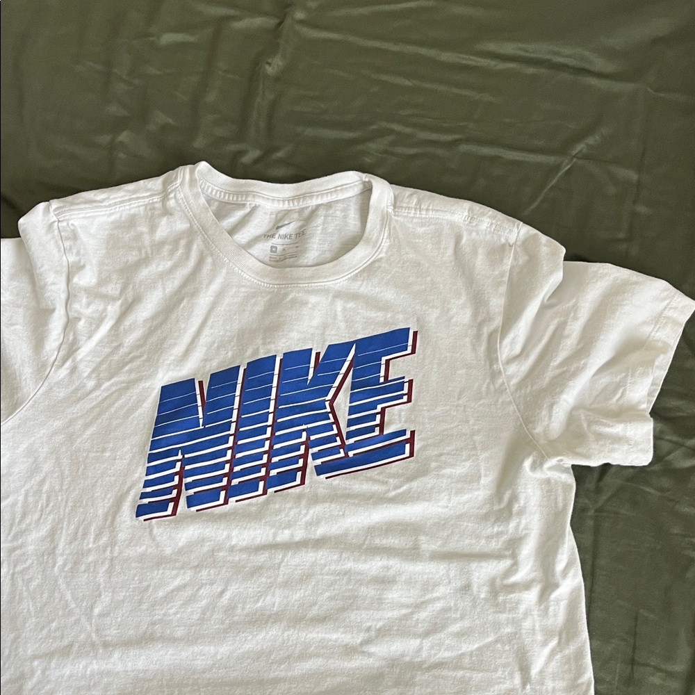 Nike White Tee with Striped Blue Logo